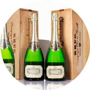 3 bottles of fine and rare champagne. Vintage Krug with original wooden case